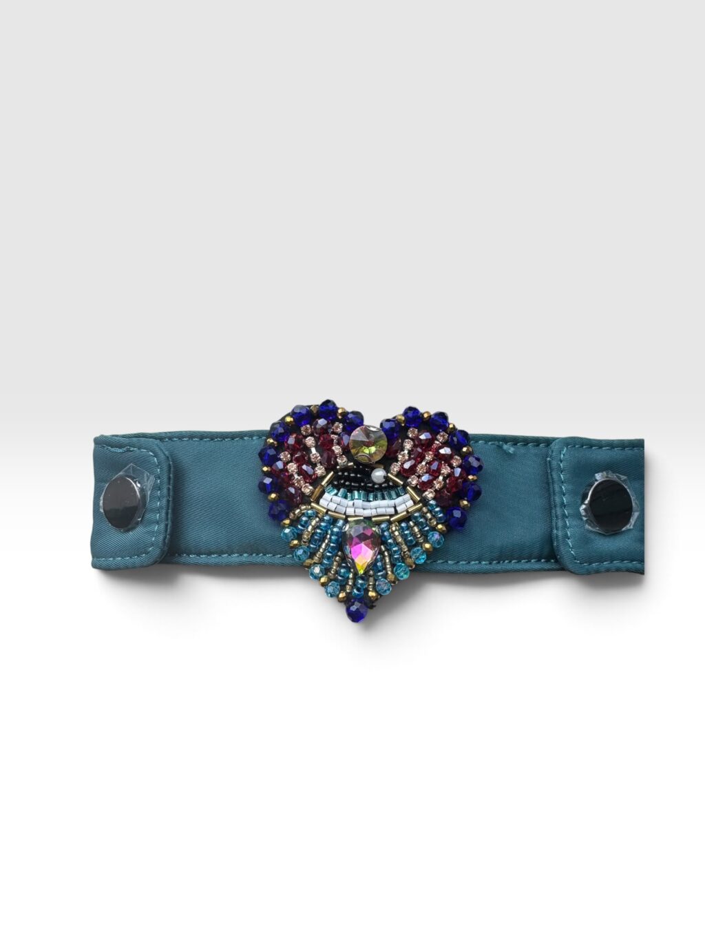 Manico Five01 e Zaino: nylon ottanio con cuore di paillettes